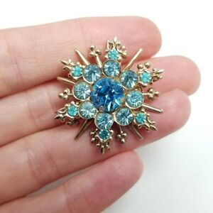 Vintage Blue Rhinestone Starburst Snowflake Shape Brooch, Gold Tone Lapel PIn